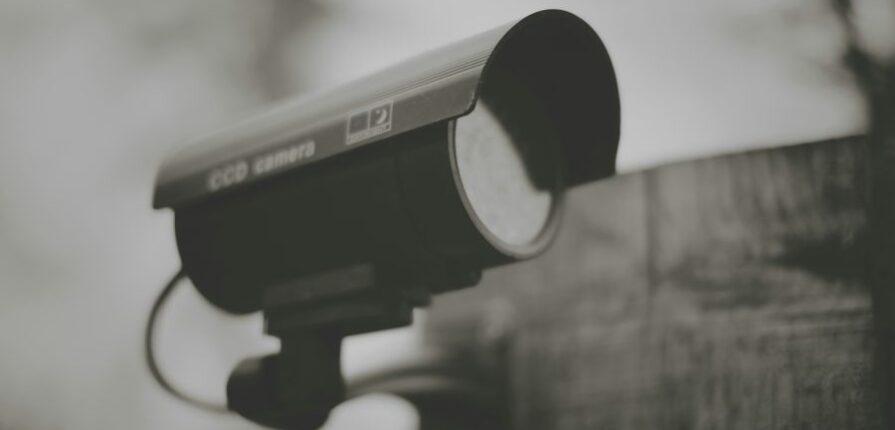 a CCTV camera monitors a business in Austin
