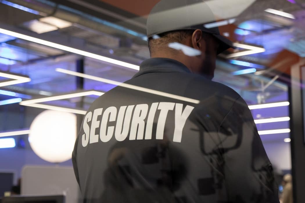 Security guard patrolling at event place inside the building