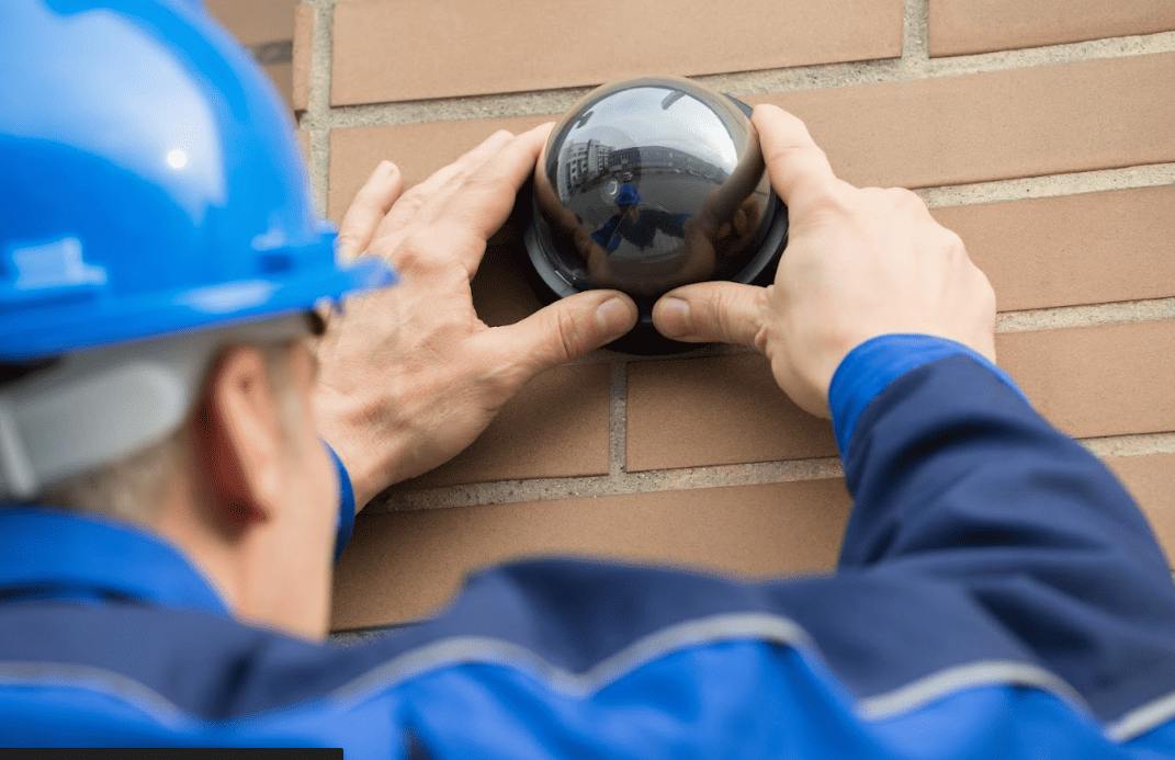 technician installing a camera